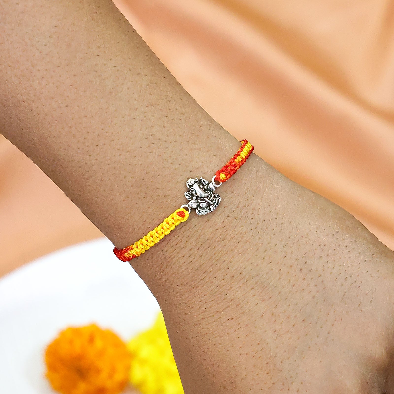 Pure Silver Rakhi - Featuring Lord Ganesha - Tweov Jewels