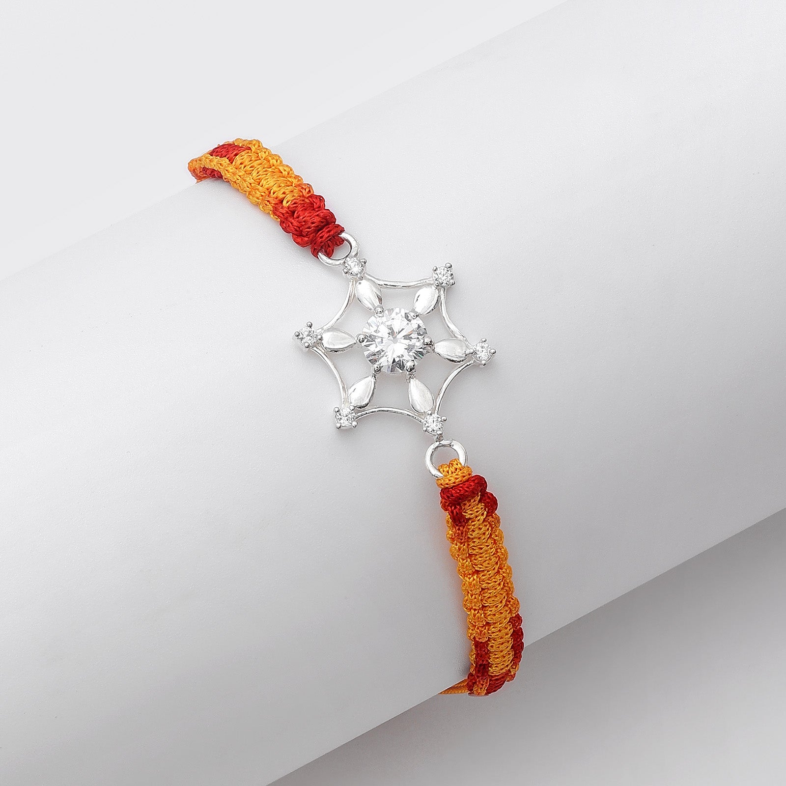 Pure Silver Rakhi - Snowflake With Rich CZ on multicolor thread. - Tweov Jewels