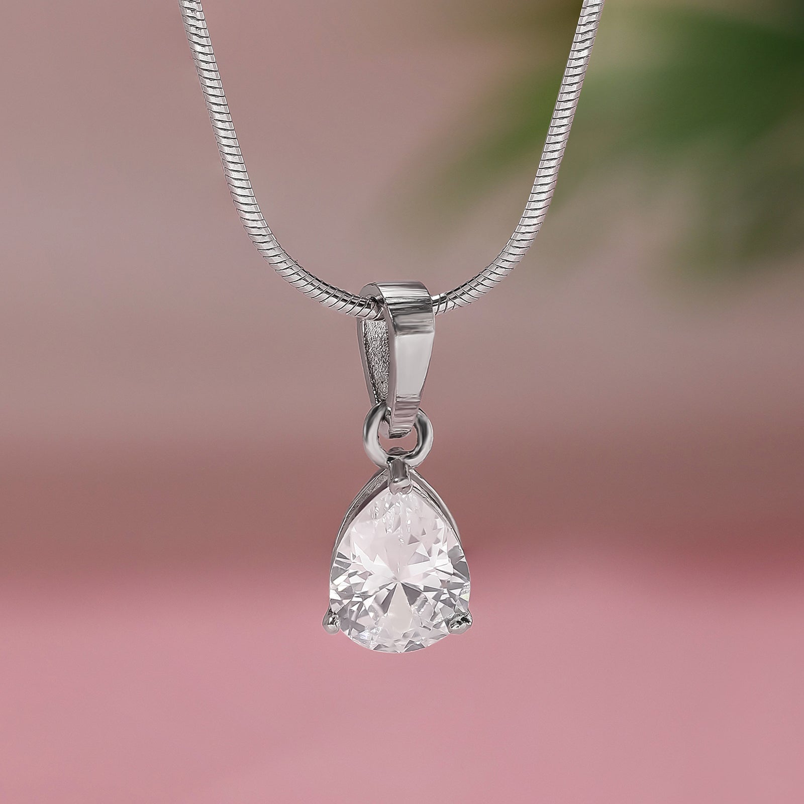 This is a 925 sterling silver necklace featuring a pear-shaped cubic zirconia or zircon pendant