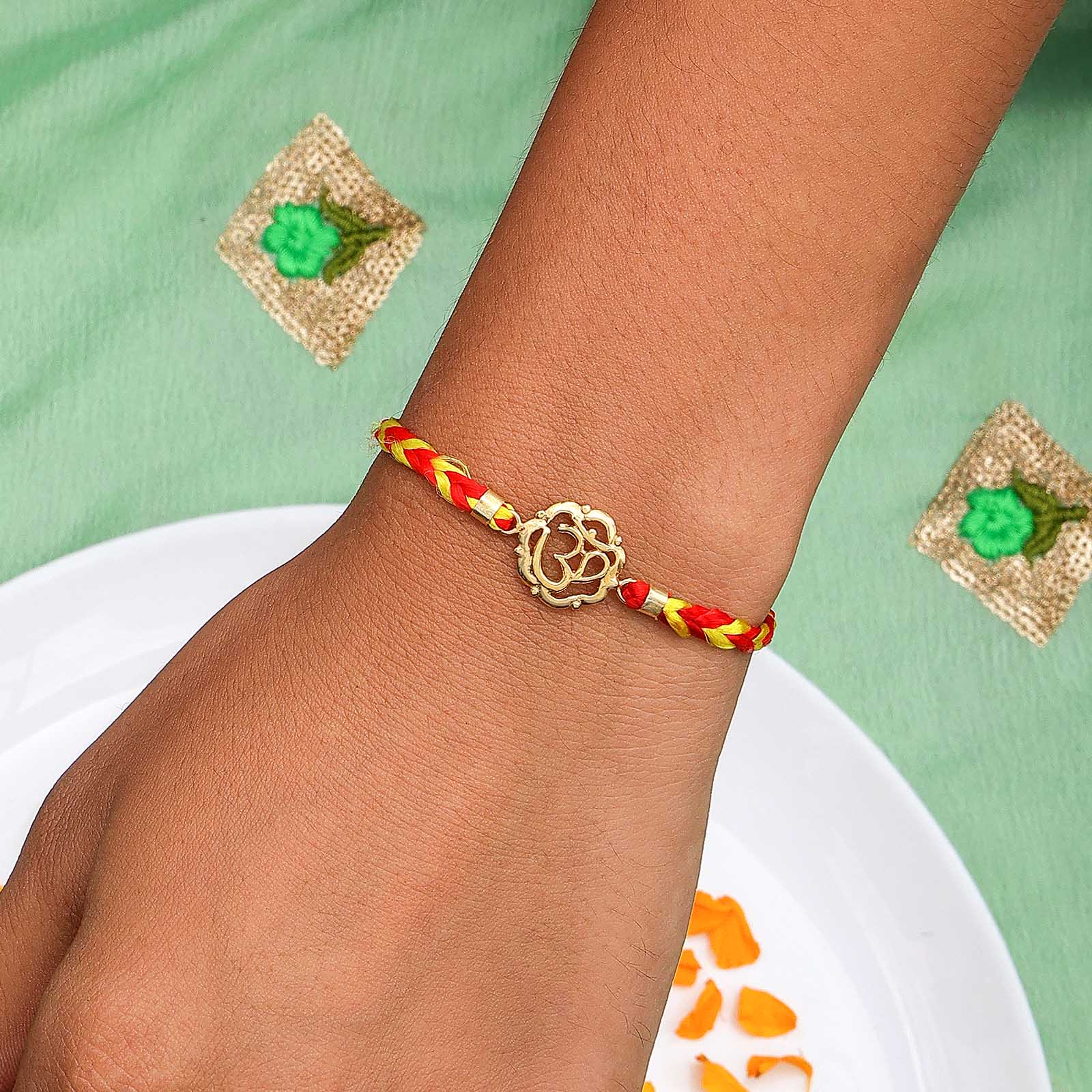 Gold-Plated Floral Design Om Silver Rakhi - Tweov Jewels