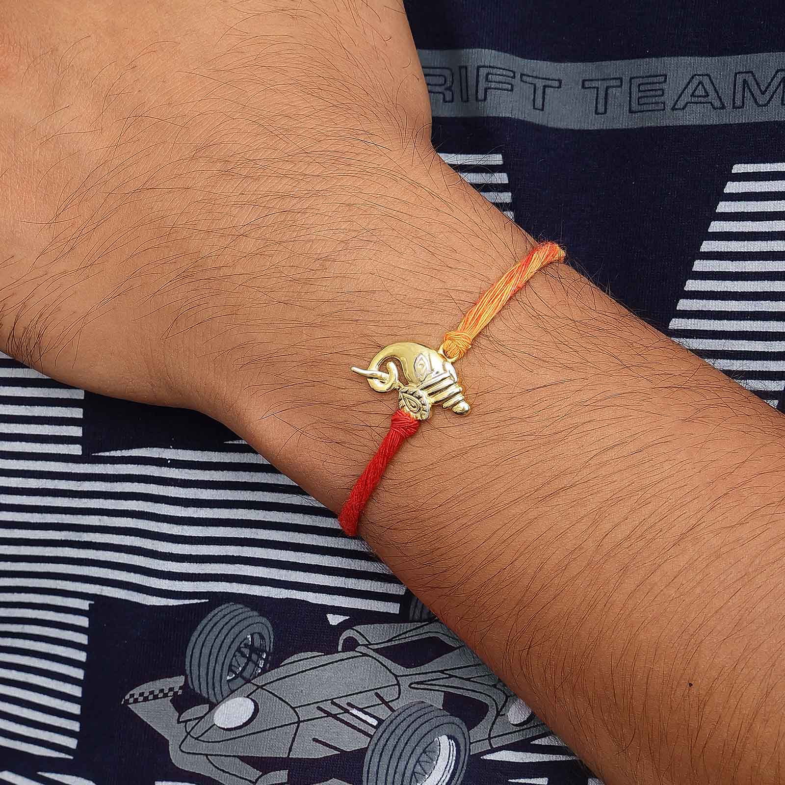 Gold Plated Lotus Holding Designer Ganesha Silver Rakhi - Tweov Jewels