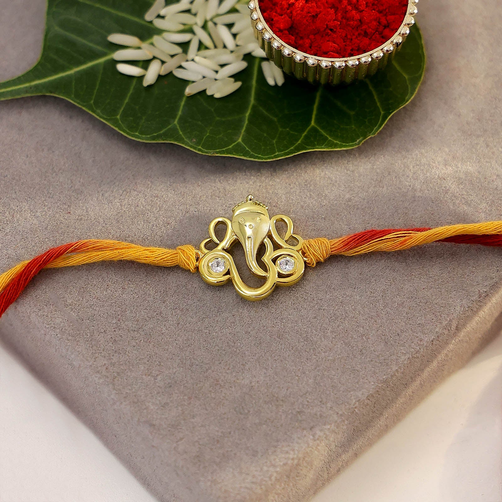 Gold Plated Ganesh Ji Silver Rakhi1